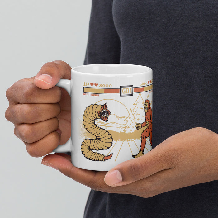 Bigfoot Vs Mongolian Deathworm | White glossy mug